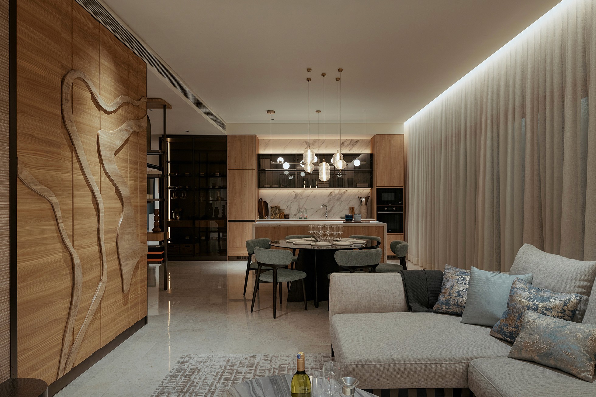 Open-plan living and dining space with sculpted timber feature wall — The Westin Residences show unit